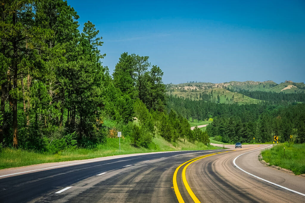 road stretching into the hills