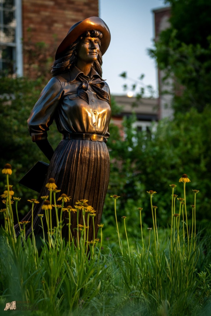 Statue of Mari Sandoz with flowers