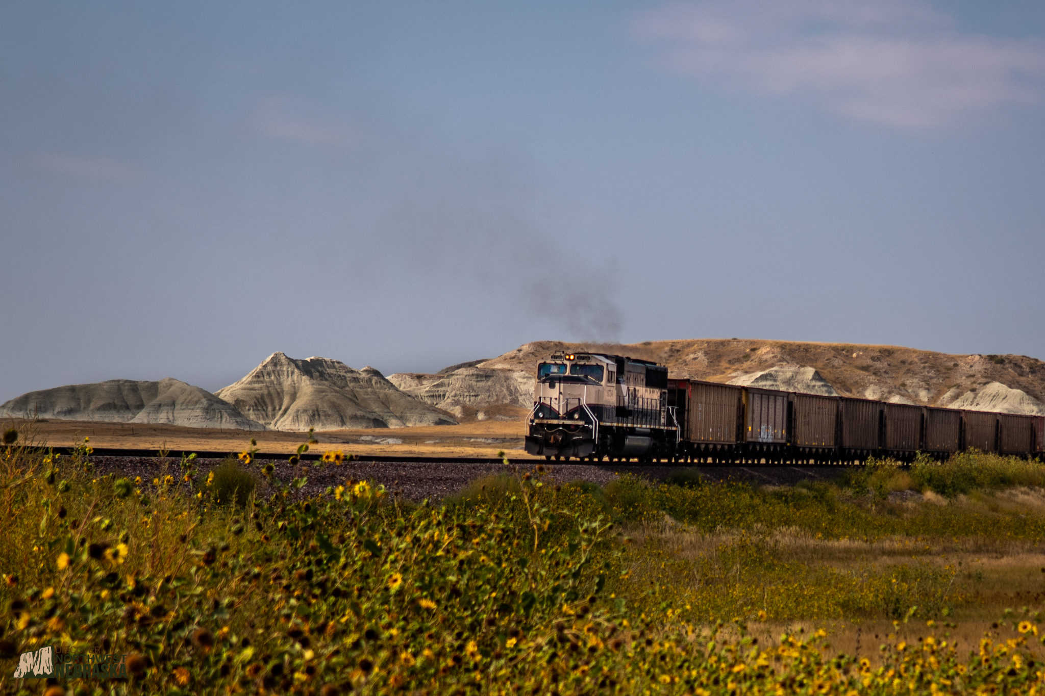 Train with Toadstool Geologic Park in the background