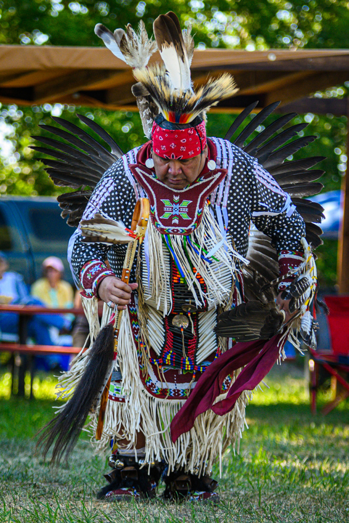 A Native Ameridan dancer in full regalia dances at the White River Wacipi.
